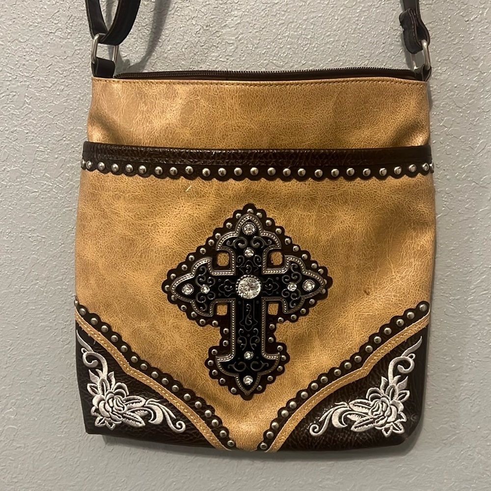 Cross body bag with bedazzled cross